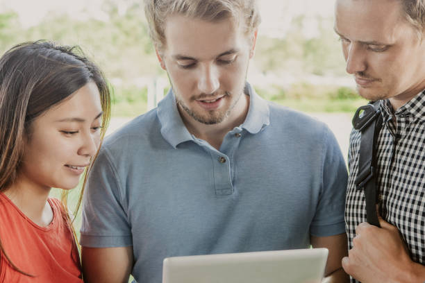istock Concentrated students reading education news 981653742