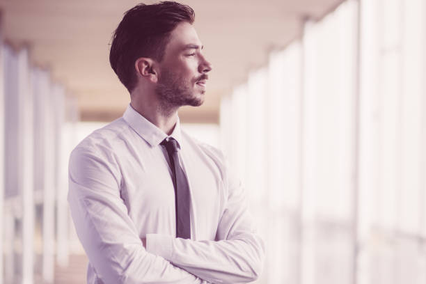 istock Ambitious and confident businessman in corridor 981678590