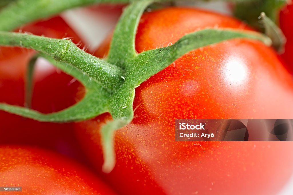 Pomodoro ciliegino macro - Foto stock royalty-free di Macrofotografia