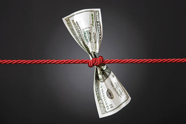 istock Tug of war with dollar 98168069