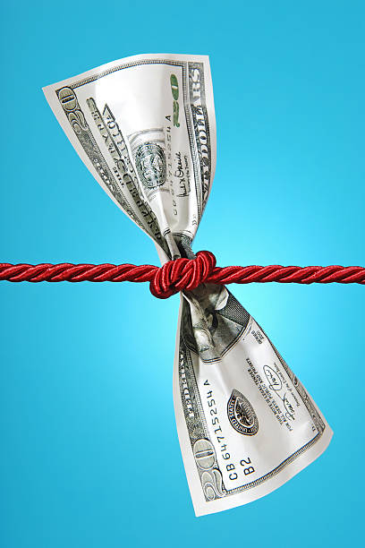 istock Tug of war with dollar 98168103