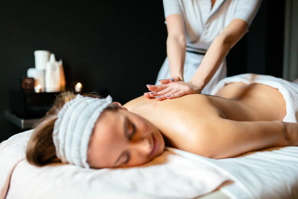 istock Beautiful woman enjoying massage 981685664