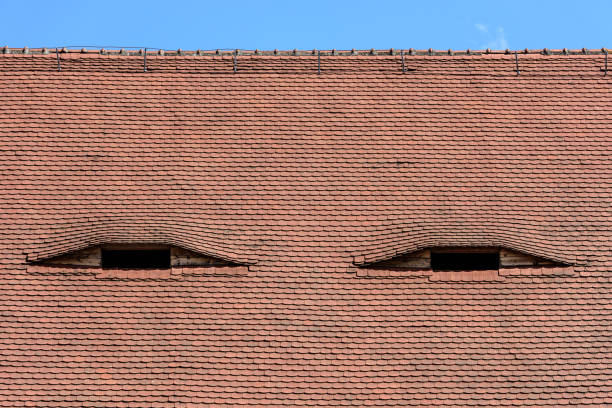 Old windows at the top of the house.