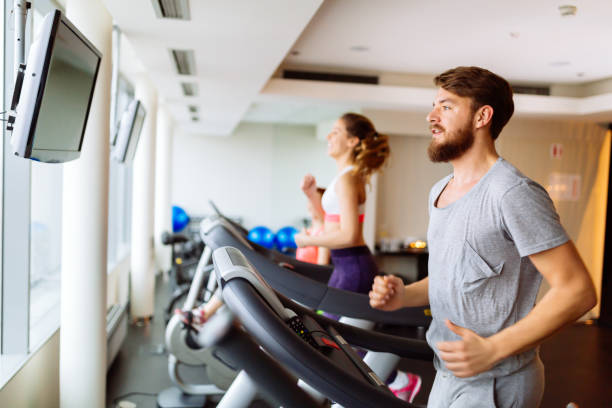istock People running on treadmill in gym 981703152