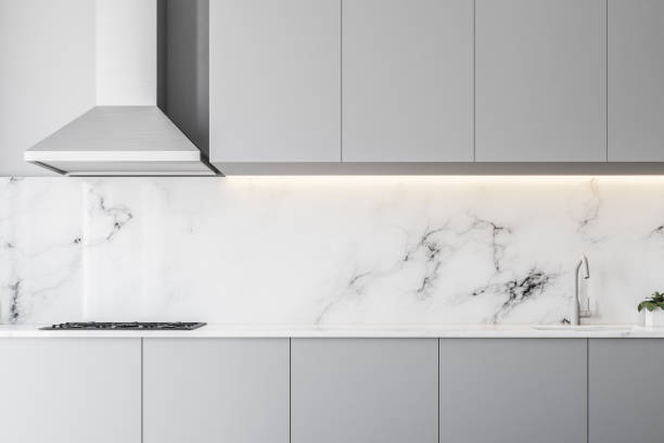 istock Marble kitchen with gray countertops close up 981711814