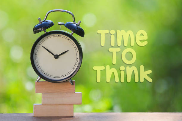 istock Black alarm clock with 