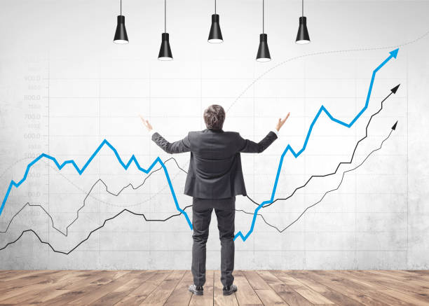 istock Happy businessman gesturing, growing proffit 981717568