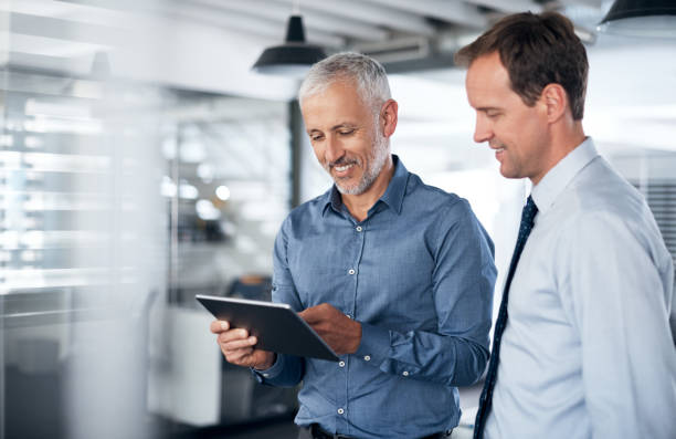 istock Teamed up with tech to make things happen 981734408