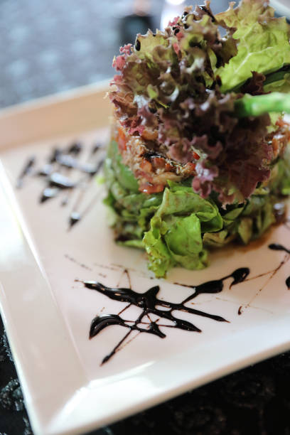 istock Salad avocado and crap with Balsamic sauce 981739852