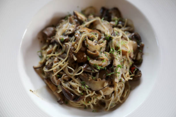 istock Spaghetti truffle cream sauce with mushroom 981739864