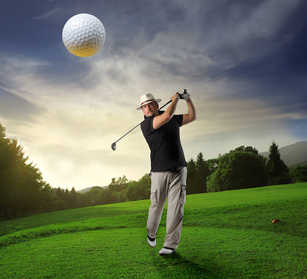 istock Golfer hitting a golf ball towards the camera 98174551