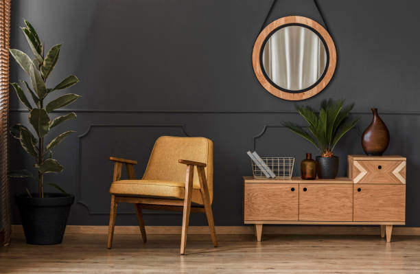 istock Yellow chair in retro interior 981745614