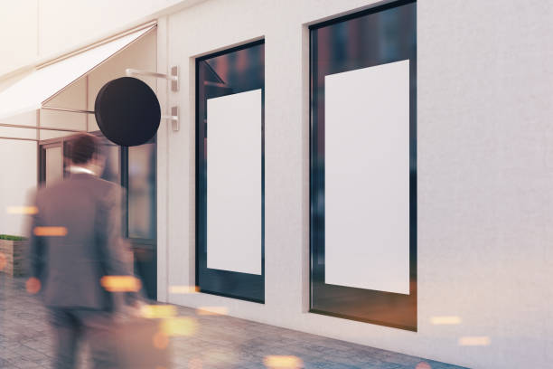 istock Man entering white wall restaurant mock up window 981747034