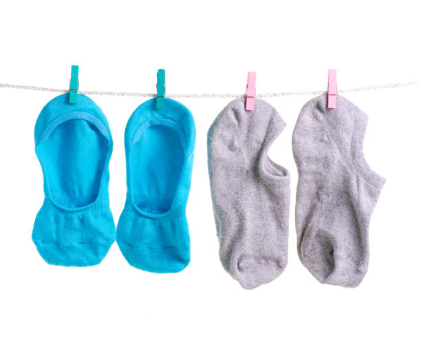 istock Socks on a rope clothespins no show socks 981749676