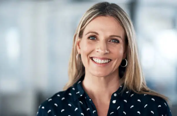 Portrait of a confident mature businesswoman working in a modern office