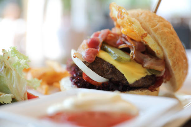 Beef Hamburger with Lettuce tomato egg and Cheese