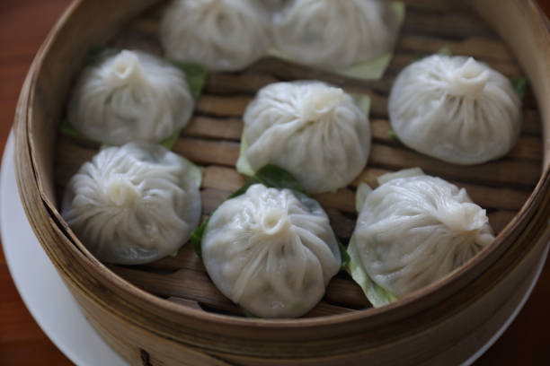 istock Dim sum dumpling on bamboo basket , Chinese food 981753360