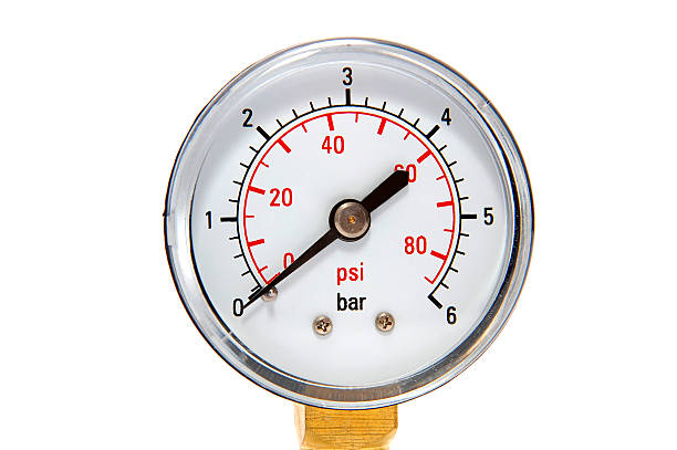 Manometre para pressão sobre um fundo branco de medição - foto de acervo