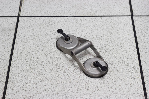 istock Suction Lifter - Tool platform - The open floor in Server room raised floor tile lifter 981756166