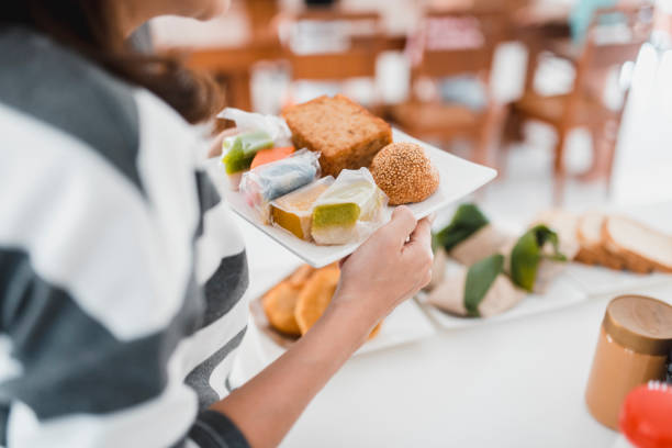 istock Mother serving breakfast food 981764356