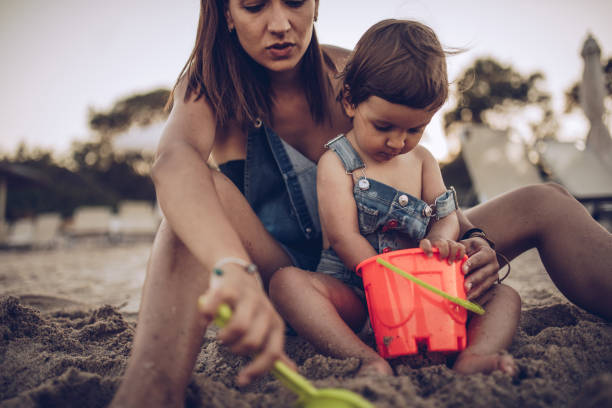 istock Child and mother playing 981764440