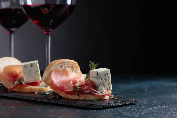 istock Sandwich with prosciutto, blue cheese and rosemary . 981770426