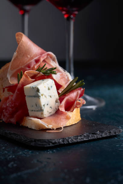 istock Sandwich with prosciutto, blue cheese and rosemary . 981770464