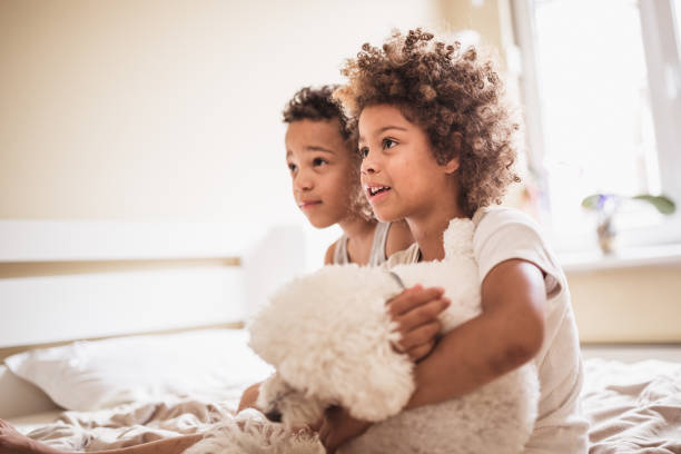 Two little girls in the early morning light