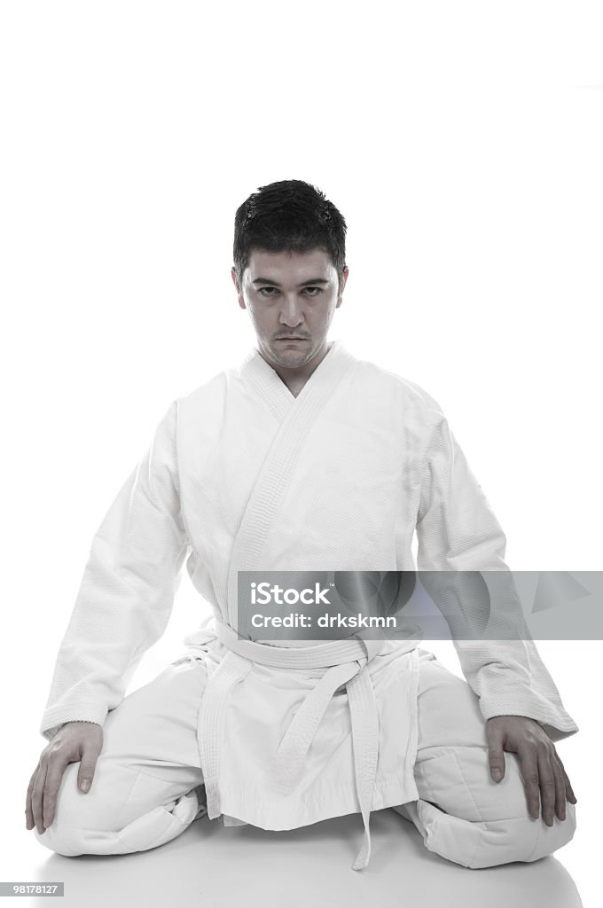 Jovem judoist - Foto de stock de Sentar sobre os calcanhares royalty-free