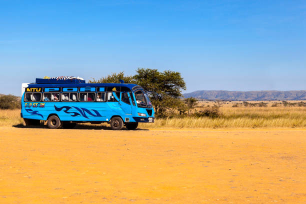 Serengeti Nat Park, Tanzania - Jun 02, 2014 : Typical and overcrowded african bus driving from Arusha to Namanga and to Serengeti National Park, bus transport is an impottant way of travel.