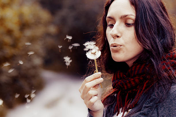 istock Girl with dandelion 98178365