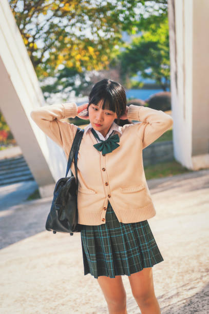 istock Beautiful chinese girl in campus 981784126
