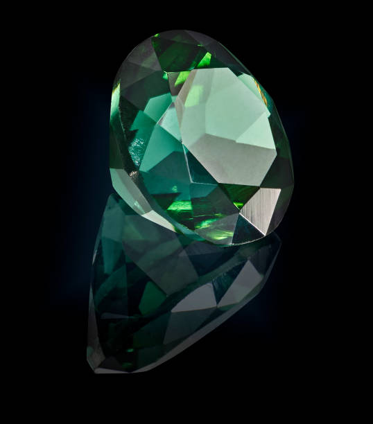 istock tourmaline gem stone isolated on black background 981787888