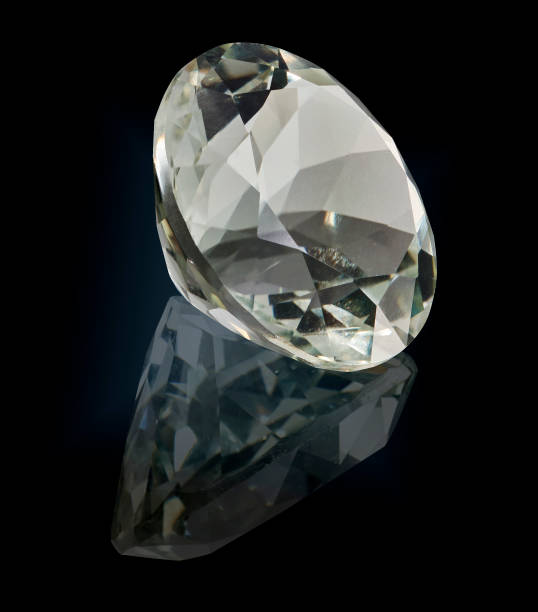 istock prasioliet  gem stone isolated on black background 981787906