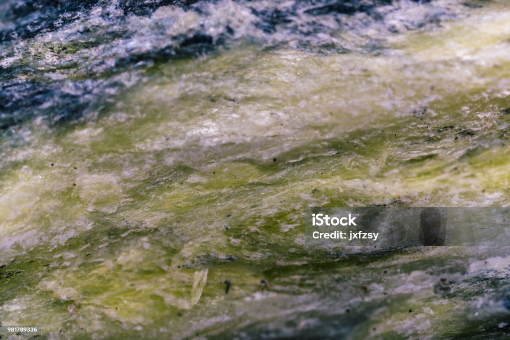serpentine rock mineral under light microscopy Igneous Rock Stock Photo