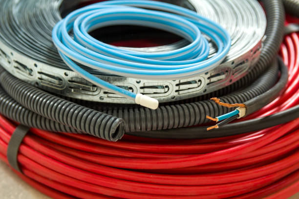 istock Heating floor system wires and cables. Renovation and construction concept. Comfort house. 981791524