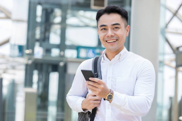 istock Handsome businessman with smart phone 981795674