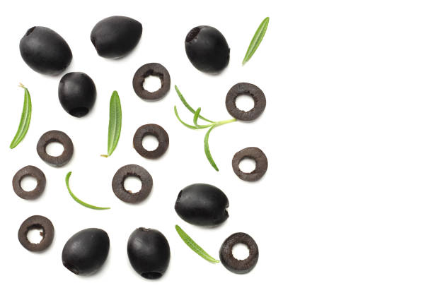 istock Marinated black olives with rosemary isolated on white background. top view 981796554