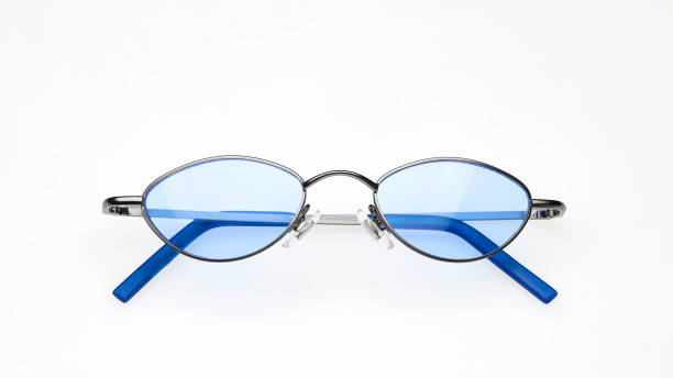 istock Sunglasses with blue lenses isolated on white background 981796580