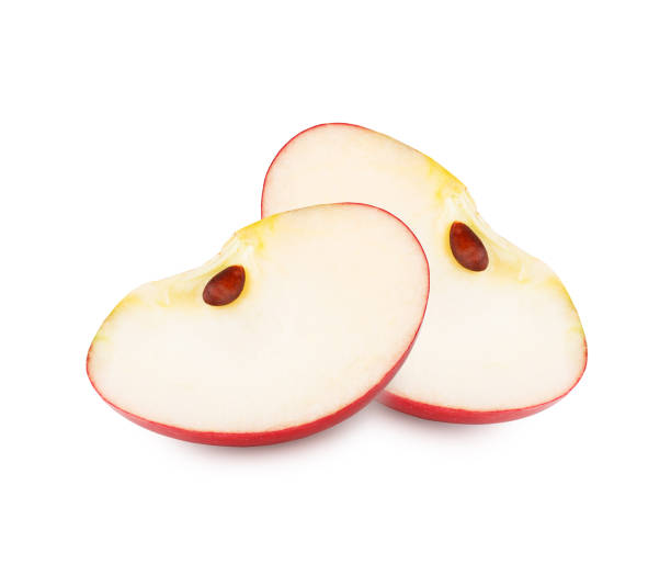 istock Slices of fresh red apple isolated on white background 981801424