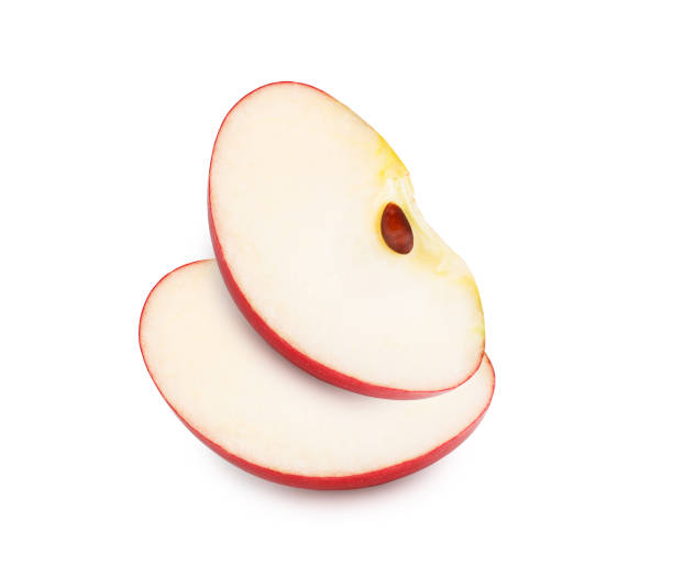 Slices of fresh red apple isolated on white background