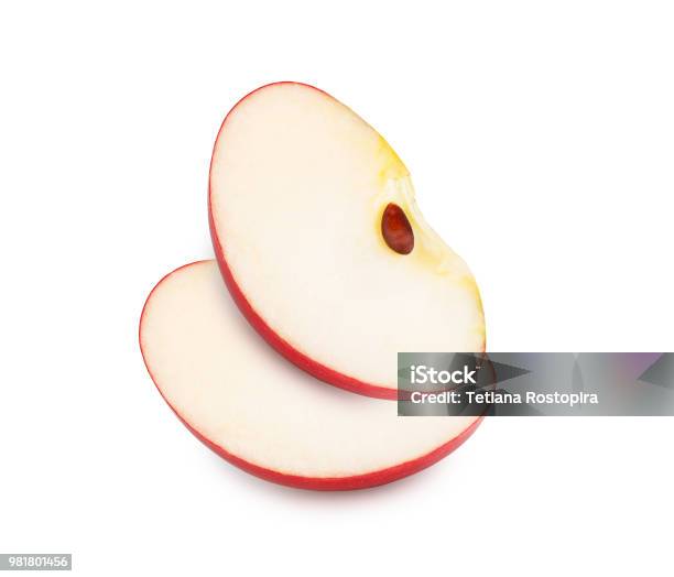 Slices Of Fresh Red Apple Isolated On White Background Stock Photo - Download Image Now