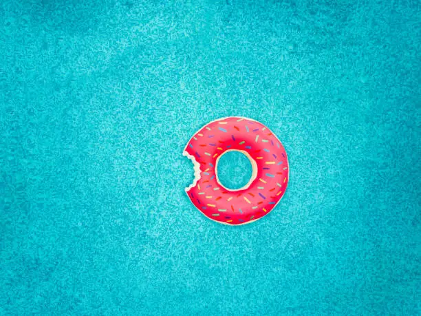 Photo of Inflatable donut swimming ring in a swimming pool