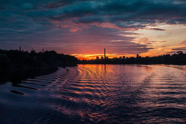 istock Dawn over the river in silent summer day 981819318