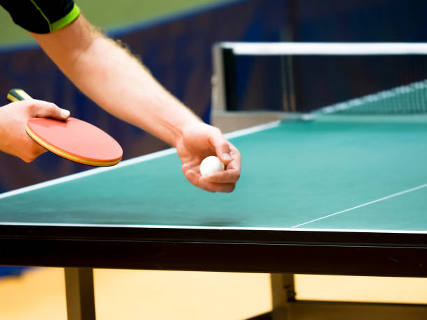 istock Cropped Hands Of Man Playing Table Tennis 981822674