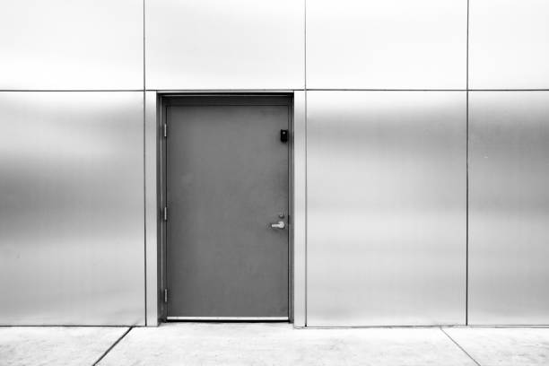 close grey door with aluminium or steel wall - aluminum brushed metal steel imagens e fotografias de stock