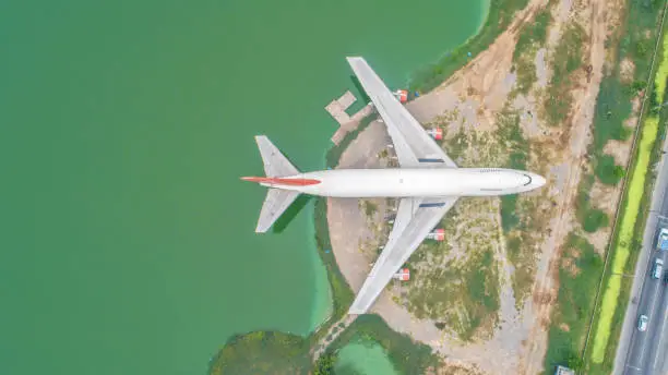 Photo of Abandoned aircraft in the reservoir area.Aerial view and top view.