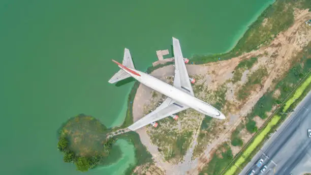 Photo of Abandoned aircraft in the reservoir area.Aerial view and top view.