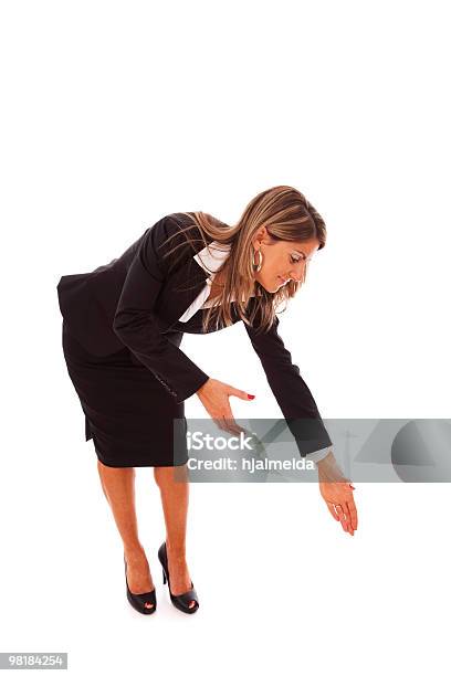 Businesswoman Bending Over Stock Photo - Download Image Now - Reaching, Moving Down, People