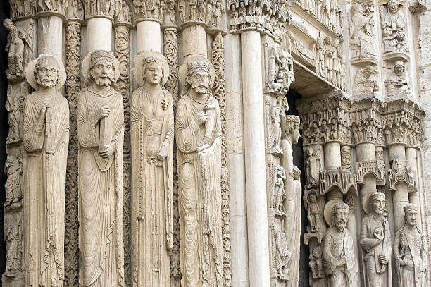 Chartres (France) - Cathedral exterior, statues Chartres (Eure-et-Loir, Centre, France) - Exterior of the gothic cathedral: closeup of the statue on the facade (circa 13th century). Unesco World Heritage SIte. chartres cathedral stock pictures, royalty-free photos & images